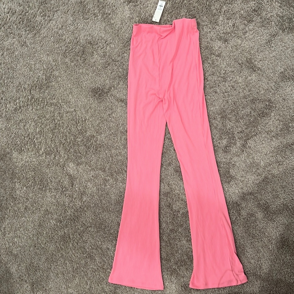 medium pink Francesca‘s flared legging pants *new with tags